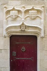 France, Gard, Saint Gilles du Gard, coat of arms above the door of a medieval house on rue Mirabeau dating from the end of the 14th century beginning of the 15th century