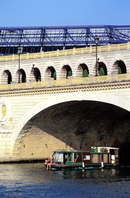 France, Paris, banks of the Seine river listed as World Heritage by UNESCO, cruise under the Bercy bridge