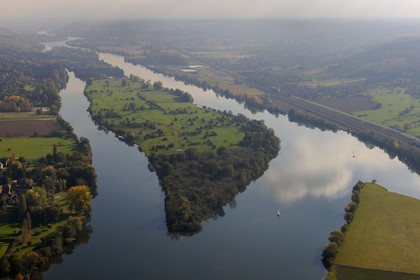 France, Eure, the Seine downstream of Vernon around Notre-Dame de l'Isle, a small boat sailing in front of the island Emient (aerial view)