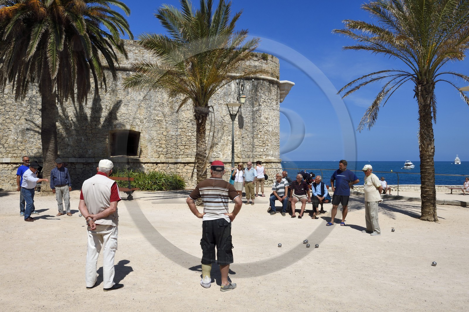 France, Alpes-Maritimes, Antibes, the bastion and the old town, petanque players