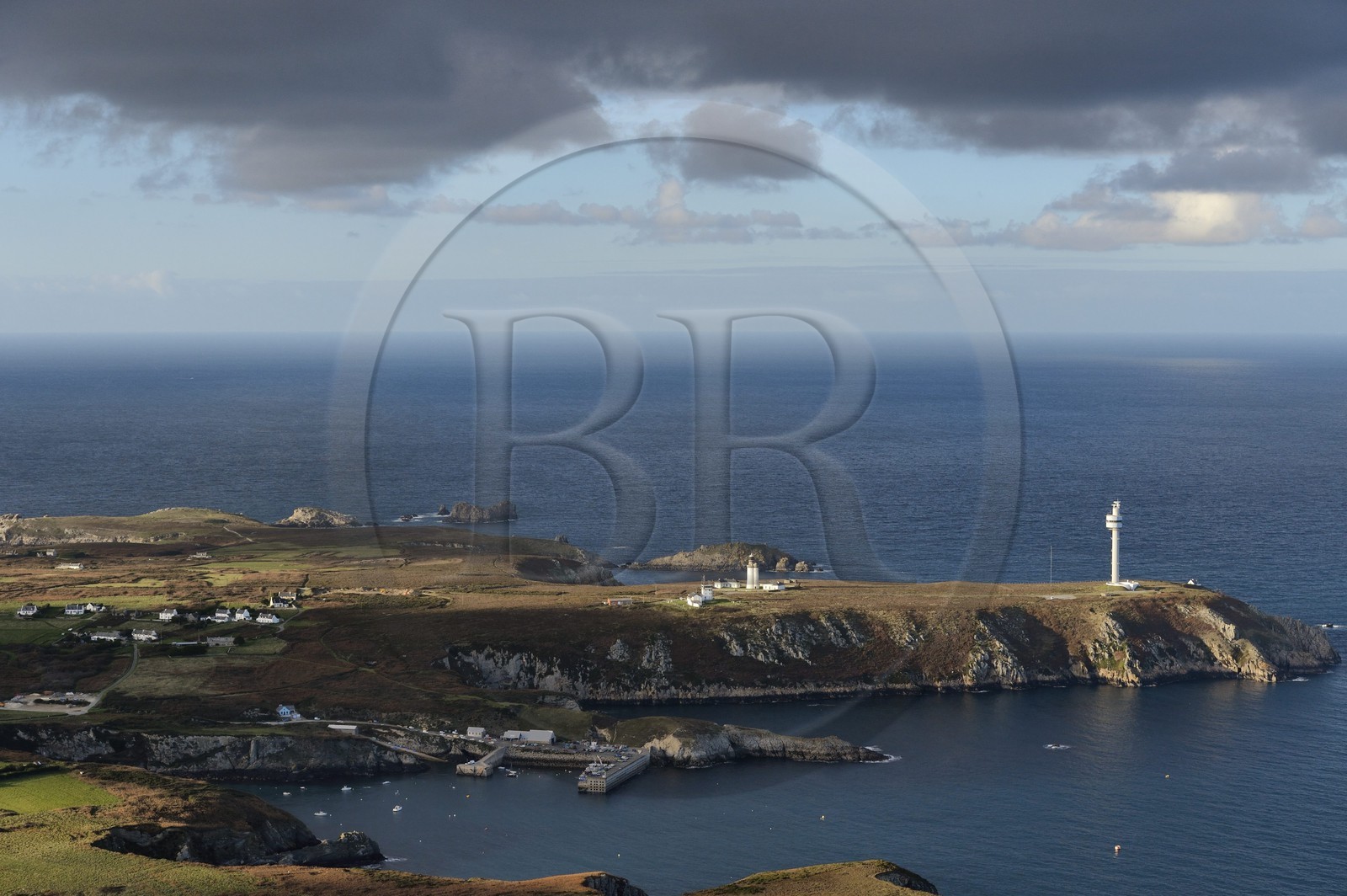 France, Finistere, the regional natural park of Armorica, Iroise sea, Ouessant island, Biosphere reserve (UNESCO), the Stiff radar tower which monitors maritime traffic from rail off Ushant and the port (aerial view)