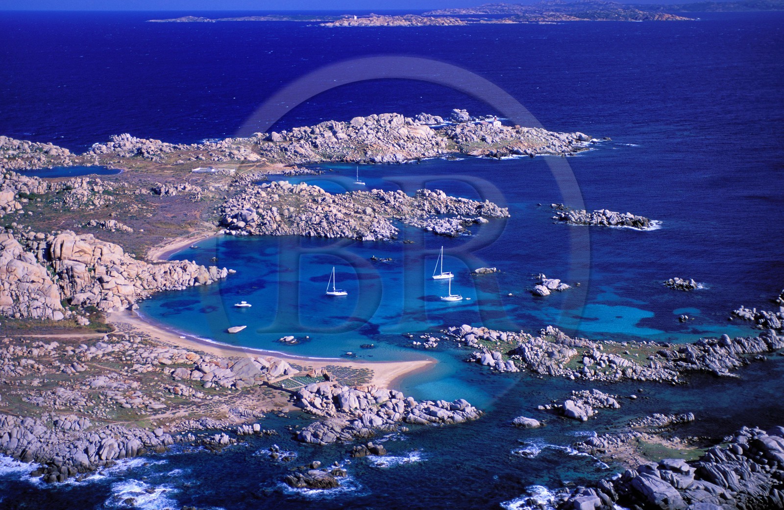 France, Corse du Sud, boats anchored in Lavezzi islands archipelago (aerial view)