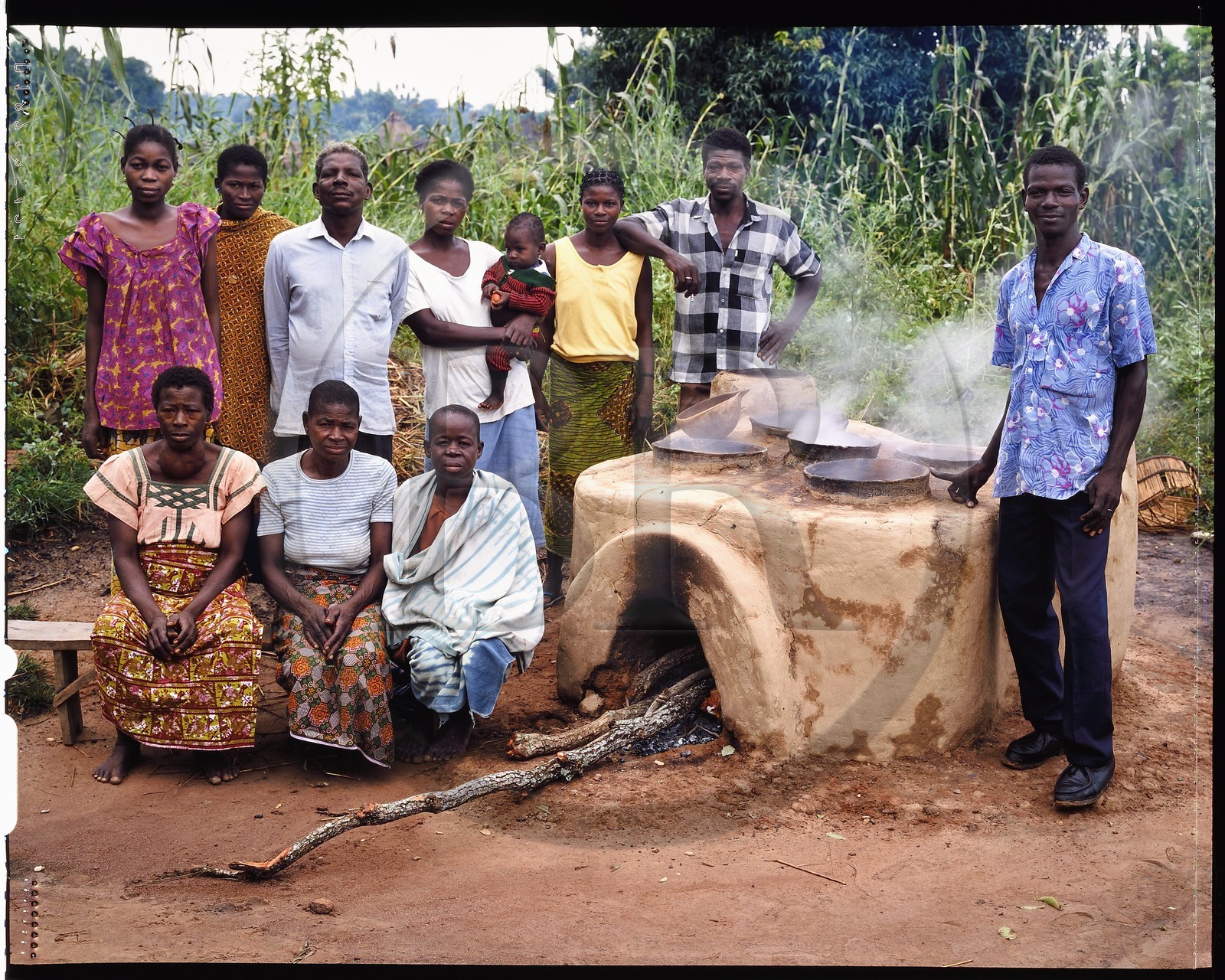 Burkina Faso, Poni province, Lobi land, Loropéni, making of the traditional Sorgho beer by women (here the wives of Celestin Kambou), fireplace where is put to boil the drink that will become the dolo also called tchapalo