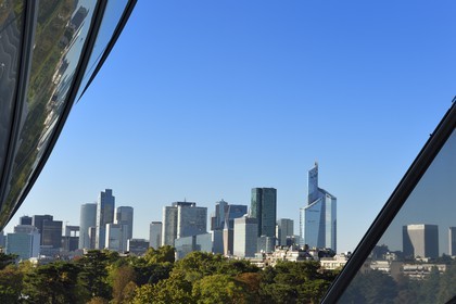 France, Paris, Louis Vuitton Foundation by architect Frank Gehry and La Defense in the background