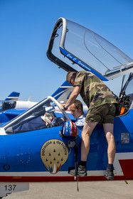 France, Bouches du Rhone, Salon de Provence, air base 701, base of the Patrouille de France (PAF for Patrouille acrobatique de France) of the French Air and Space Force, the pilot, Captain Cédric Queyranne, finishes preparing in his cockpit alongside adjudant Nicolas Renard, his mechanic, for a flight aboard his Alphajet aircraft