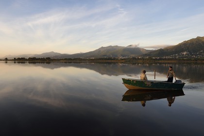 France, Haute Corse, the pond of Biguglia (Stagnu di Chiurlinu) at dawn, nature reserve of Corsica (RNC), Paul-Marie Ghipponi guard of the natural reserve of Corsica (RNC) patrolling the pond