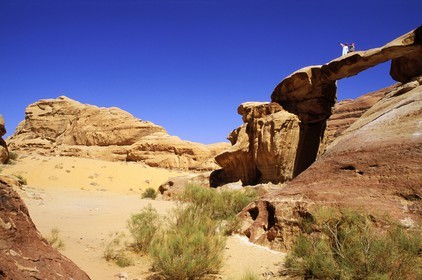 Jordan, Wadi Rum, Bedouins on the stone bridge of Um Fruth