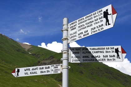 Georgia, Upper Svaneti (Zemo Svaneti), village of Ushguli, listed as World heritage by UNESCO, hiking signposts