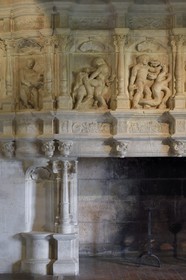 France, Dordogne, Périgord Vert, Villars, Puyguilhem castle, the Great Hall with its fire-place depicting the labours of Hercules