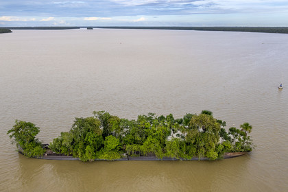 France, French Guiana, Saint-Laurent-du-Maroni, the wreck of the British merchant ship Edith Cavell, which ran aground in 1924 and became an island on the Maroni River (aerial view)