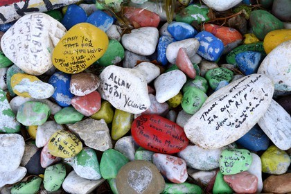 South Africa, Gauteng Province, Johannesburg, Mandela's house situated in the pleasant quiet wooded area of Houghton, piles of stones painted by well-wishers
