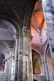 France, Haute Loire, Brioude, the Basilica of Saint-Julien de Brioude in Auvergne Romanesque style, pillars of the nave surmounted by capitals decorated with motifs and covered with frescoes