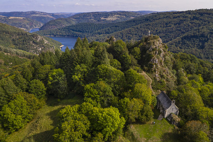 France, Cantal, Paulhenc, the Gorges de la Truyere (Truyere river canyon), the Rocher de Turlande, Romanesque castral chapel of the castle destroyed during the Hundred Years War in which was born Robert de Turlande, founder of the Abbey of La Chaise Dieu (aerial view)