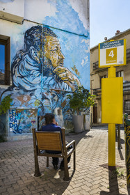 France, Herault, Sete,  Quartier Haut (the Upper Quarter), mural fresco which is part of the MACO (Musee à ciel ouvert) - Open-air museum, The Thinker of Sète by the artist C215 in the Rue des Députés