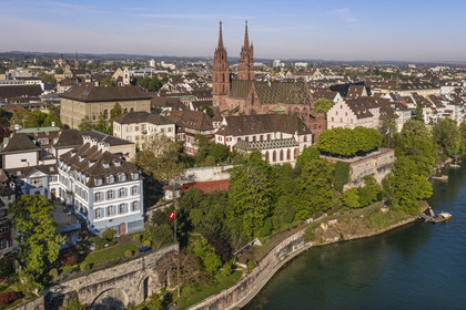 Switzerland, Basel, the left bank of the Rhine, the Minster or Protestant Cathedral of Our Lady of Basel (Munster) overlooking the Rhine (aerial view)