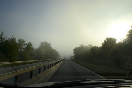 Germany, Saarland, fog on a road at the French border