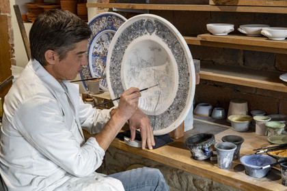 France, Nièvre, Nevers, Fayencerie d’art de Nevers, master earthenware maker Clair Bernard in his workshop on rue Sabatier