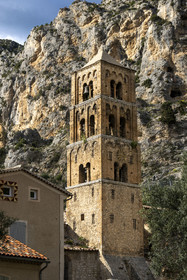 France, Alpes de Haute Provence, Parc Naturel Régional du Verdon, village of Moustiers Sainte Marie, labelled Les Plus Beaux Villages de France (The Most Beautiful Villages of France), the Notre-Dame-de-l'Assomption church with its 12th century bell tower