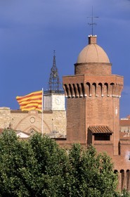 France, Pyrenees Orientales, Perpignan, old town and the Castillet with the catalan flag, part of the old walls