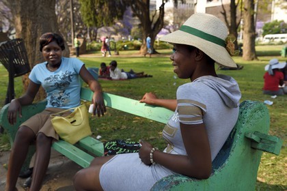 Zimbabwe, Harare, African Unity Square (formerly Cecil Square), young girl wearing a hat