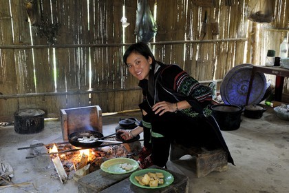 Vietnam, Lao Cai province, Sapa district, inside a house of a Black Hmong ethnic group, daily life in the kitchen cooking the Tofu