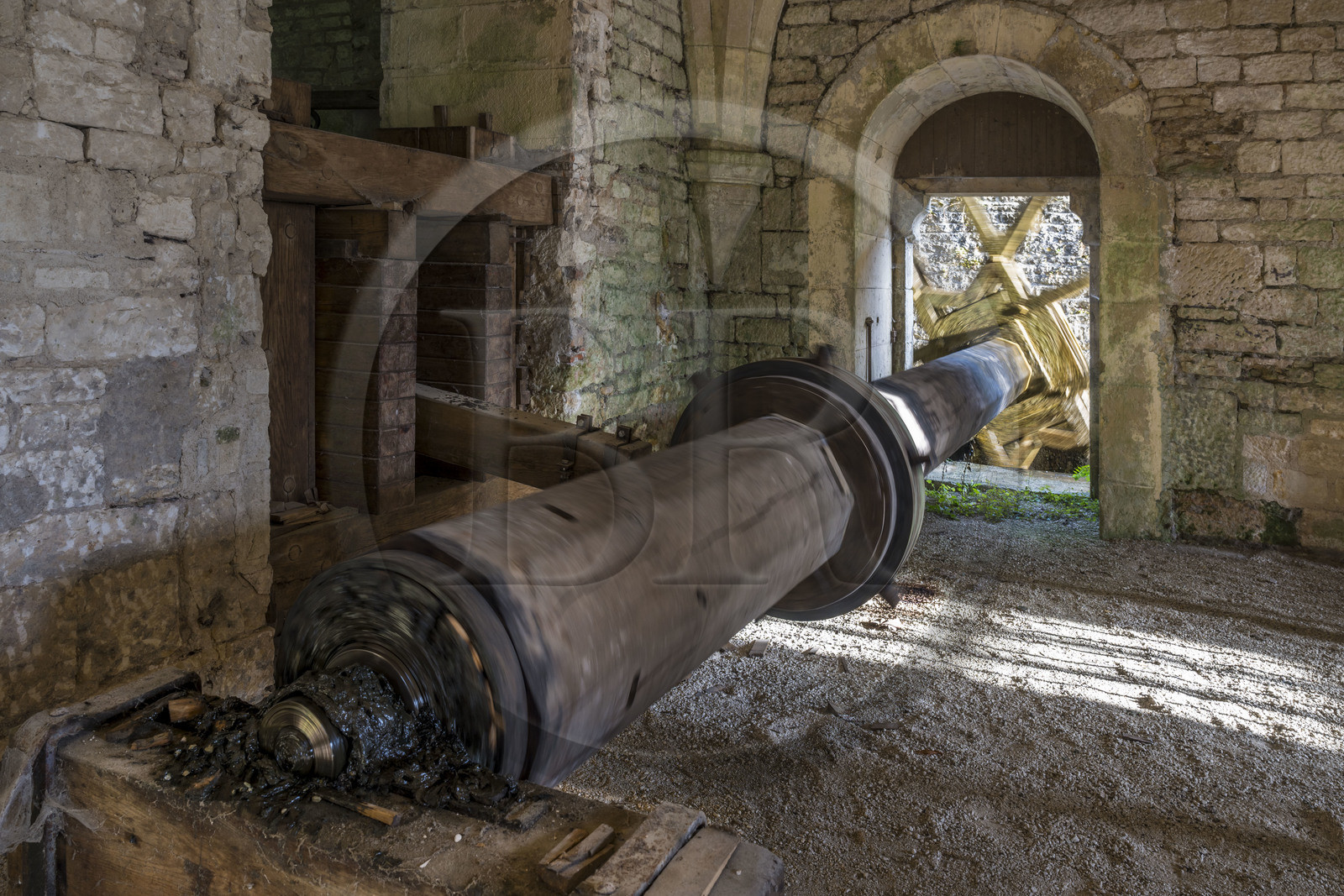 France, Cote d'Or, Marmagne, the Cistercian Abbey of Fontenay listed as World Heritage by UNESCO, the 12th century hydraulic forge, reconstruction of a martinet, a large rocking hammer once powered by hydraulic energy to forge iron