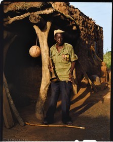 Burkina Faso, Poni province, Lobi land, Loropéni, decorated French veteran who has, dixit, made Indochina, Algeria and Paris 18th district posing with a handmade pistol in his farmyard