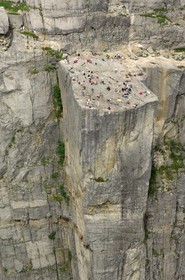 Norway, Rogaland, hikers on the Pulpit Rock (Preikestolen)  in the Lysefjord - fjord of Lysebotn (aerial view)