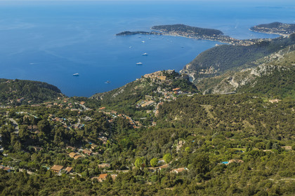 France, Alpes-Maritimes, the hilltop village of Eze on the middle corniche and the peninsula of Saint-Jean-Cap-Ferrat in the background
