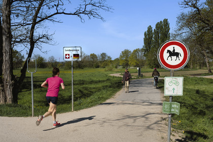 Switzerland, Basel, Neuer Teich Bach, the border between Switzerland and Germany