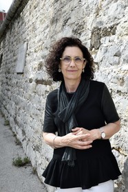 France, Var, Toulon, the naval base (Arsenal), Cristina Baron, administrator and curator of the National Maritime Museum in front of the remains of the wall of the arsenal built from 1685 by order of Vauban