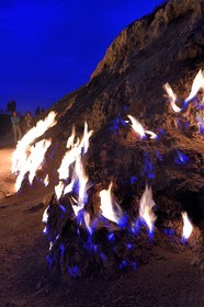 Azerbaijan, Baku, Absheron Peninsula, Yanar Dag meaning burning mountain is a natural gas fire which blazes continuously on a hillside