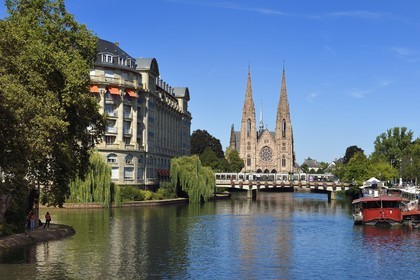 France, Bas Rhin, Strasbourg, Neustadt district dating from the German period listed as World Heritage by UNESCO, Saint Paul Protestant church and the Royal bridge over the Ill river and ESCA building left