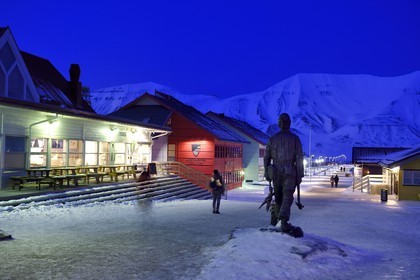 Norway, Svalbard, Spitzbergen, Longyearbyen, the miners’ memorial bronze statue stands in the square between Lompensentret and the Svalbard shop in main street