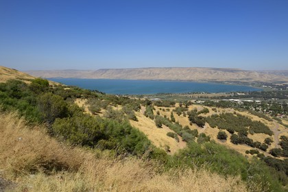 Israel, Northern District, Galilee, Tiberias, Sea of Galilee (Lake Tiberias) edges and in the background the hills of Golan