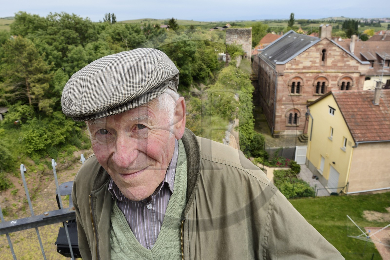 France, Bas Rhin, Westhoffen, Roger Cahn, the last Jew of Westhoffen born in 1930, the former synagogue in the background France, Bas Rhin, Westhoffen, Roger Cahn, the last Jew of Westhoffen born in 1930, the former synagogue in the background