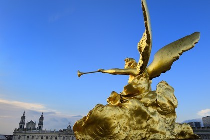 France, Meurthe-et-Moselle, Nancy, Place Stanislas (former Place Royale) built by Stanislas Leszczynski in the 18th century, listed as World Heritage by UNESCO, statue on the Triumph Arch (Here Gate), the City Hall and the Cathedral in the background