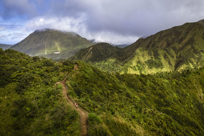 Caribbean, Dominica Island, Castle Bruce, Morne Trois Pitons National Park listed as World heritage by UNESCO, hikers on the trail leading through the rainforest to the Desolation Valley and then to Boiling Lake (aerial view)