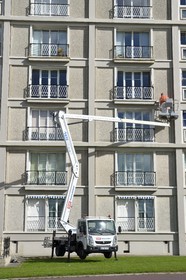 France, Seine Maritime, Le Havre, Downtown rebuilt by Auguste Perret listed as World Heritage by UNESCO, work on the Perret building facade of the Porte Océane