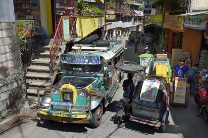 Philippines, Ifugao province, Banaue town, jeepney (elongated jeep to transport passengers) in the main street