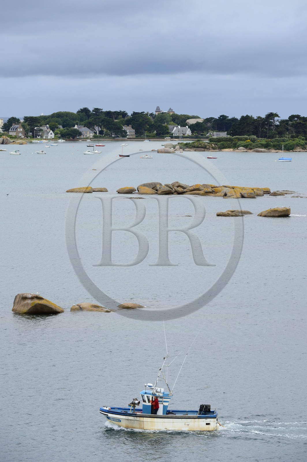 France, Cotes-d'Armor, Cote de Granit Rose (the Pink Granite coast), Tregastel, fishing boat