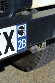 France, Haute Corse, Balagne, the Giussani, number plate with the Moor's head emblem of Corsica