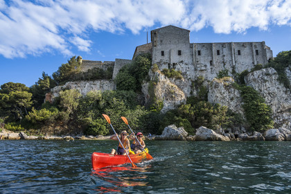 France, Alpes-Maritimes, Cannes, kayaking in the Lerins Islands, along the north coast of Sainte-Marguerite island in front of the Fort Royal fortified by Vauban