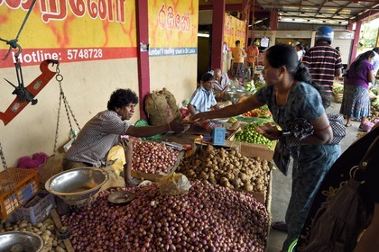 Sri Lanka, Eastern Province, Trincomalee, the covered market, selling vegetables