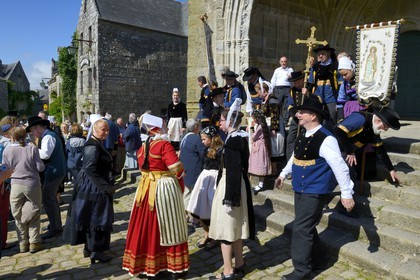 France, Finistere, Locronan, labelled Les plus Beaux Villages de France (The Most Beautiful Villages of France), going out Saint Ronan church at the end of the procession of the Tromenie
