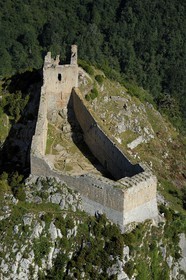 France, Ariege, Pays d' Olmes, Cathar Castle of Montsegur perched on a rock and the Pyrenees (aerial view)..