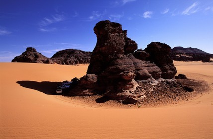 Libya, region of the desert, the Fezzan (Sahara), Tadrart Akacus, break in the shade of a rock