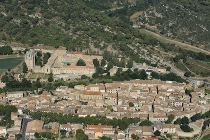 France, Aude, Lagrasse village, labelled Les Plus Beaux Villages de France (The Most Beautiful Villages of France), Sainte Marie de Lagrasse Abbey (aerial view)