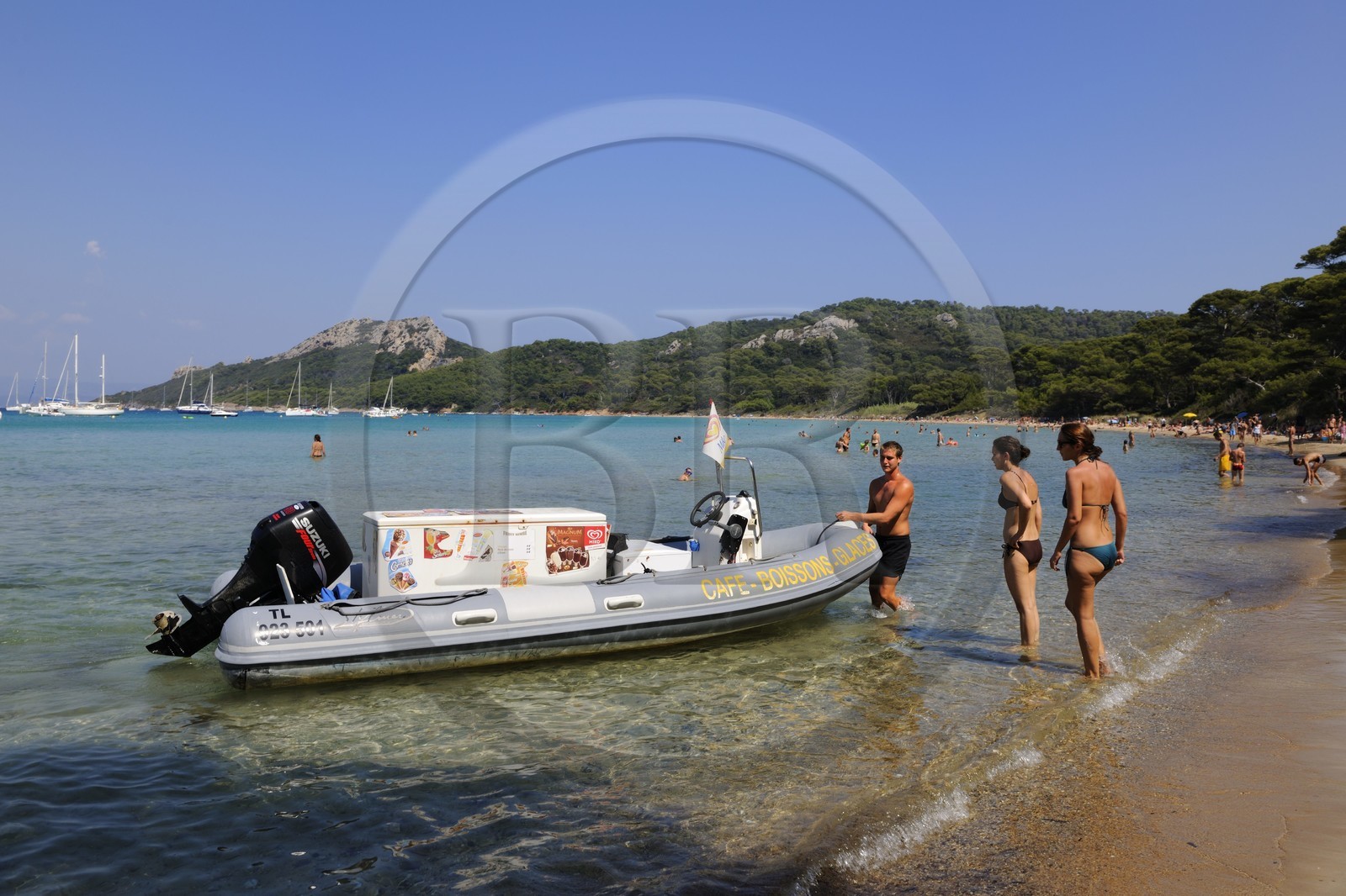 France, Var, Iles d'Hyeres, National Park of Port Cros, ile de Porquerolles, Plage Notre Dame, holidaymakers in front of the ice-cream seller boat
