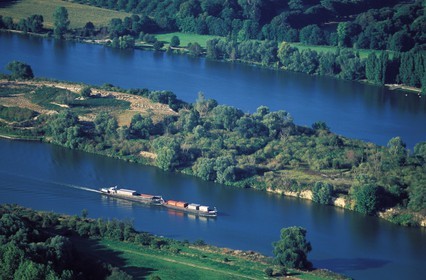 France, Eure, boat freight on river Seine (aerial view)